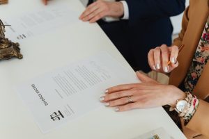 Woman signing a divorce decree